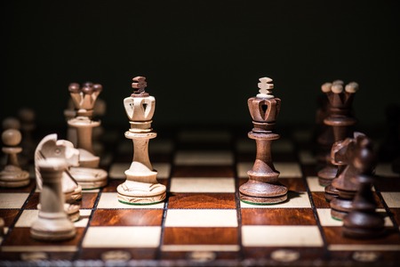black against white king chess pieces on chess boardの写真素材
