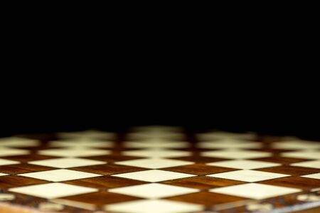 abstract chessboard on dark backgroundの写真素材