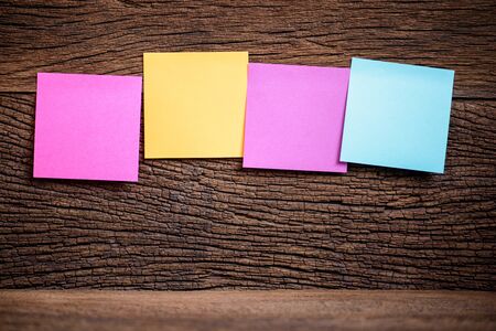 stickys note on wood background