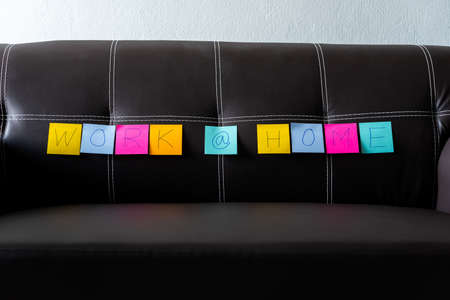 work at home sticky note on home sofa