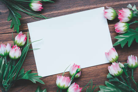 empty photo frames on wooden background