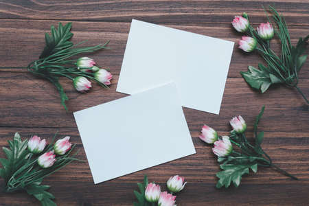 empty photo frames on wooden background