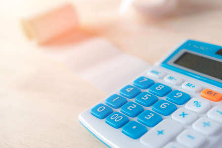 calculator with many bills that must be paid