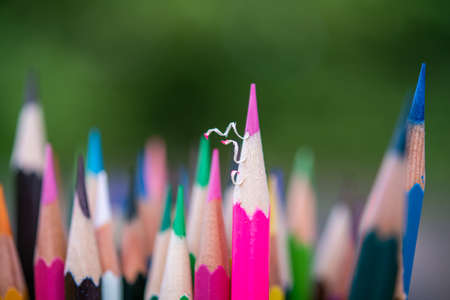 many color pencil on green backgroundの写真素材