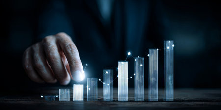 Person Using Digital Tools to Analyze Business Growth and Financial Projections with Target Technology for Year 2026 in Dark Backgroundの素材