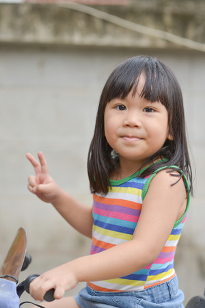 Cute asian girl  enjoy playing toy carの写真素材