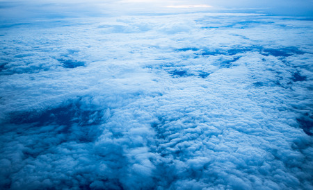 Cloud sky on airplane in evening