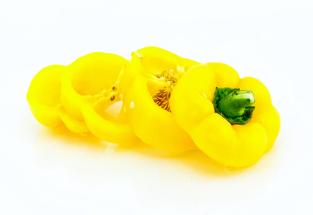 yellow sweet pepper slice on white background