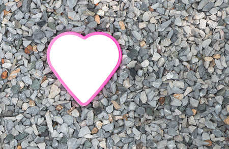 Abstract white heart on breccia backgroundの写真素材