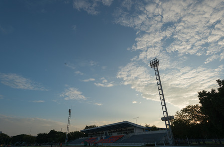 Silhouette soccer Stadium on evening skyのeditorial素材