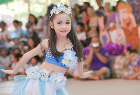 LOP BURI, THAILAND. - NOVEMBER 24: The cute Asian cheerleaders of students show in sports day on November 24, 2013 at Banjongrat school in Lop buri, Thailand.のeditorial素材