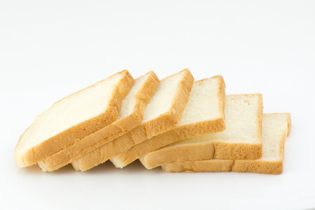sliced bread isolated on white backgroundの写真素材