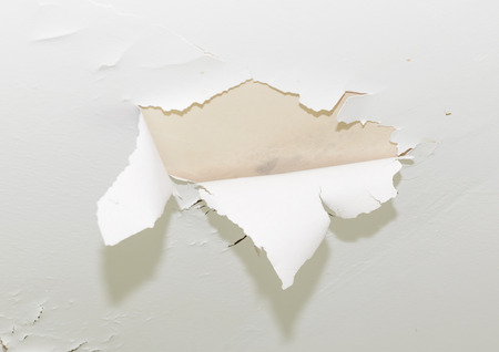 cracked paint on wall backgroundの写真素材