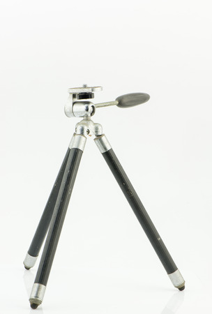 Old small tripod isolated on white backgroundの写真素材