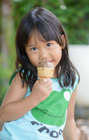 cute asian girl like to eat ice creamの写真素材