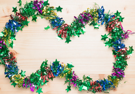 wooden background and colorful ribbonの写真素材