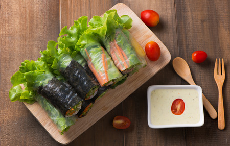 salad roll on wood plate, concept healthy food or clean food.の写真素材