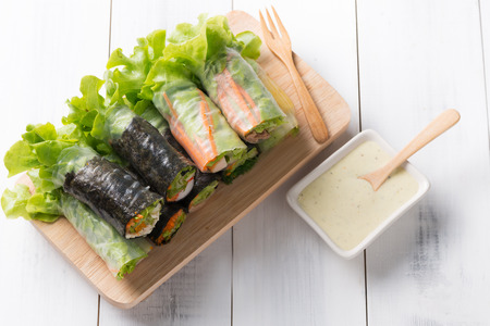 salad roll on wood plate, concept healthy food or clean food.