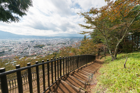 Step trail to sightseeing   Cityscape of Shimoyoshida city with Fuji mountain on autumn in japan.の写真素材