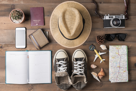 Travel plan, trip vacation, tourism mockup - Outfit of traveler on wooden background. Flat lay..の写真素材