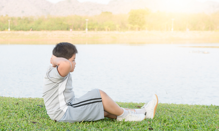 obese fat boy exercise to lose weight. healthy concept..の写真素材