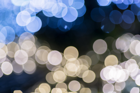 gold and blue bokeh on night, for christmas and new year backgroundの写真素材