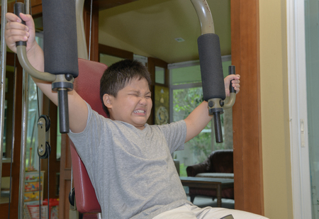 obese fat bot exercise in fitness room,Exercise to lose weight concept.