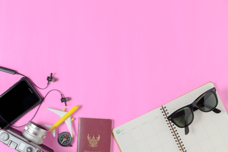 accessories for travel on pink background, summer travel concept with copy space.の写真素材