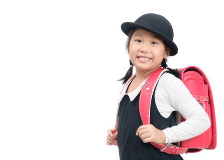 Cute Japanese student with school  bag isolated on white background, back to school conceptの写真素材