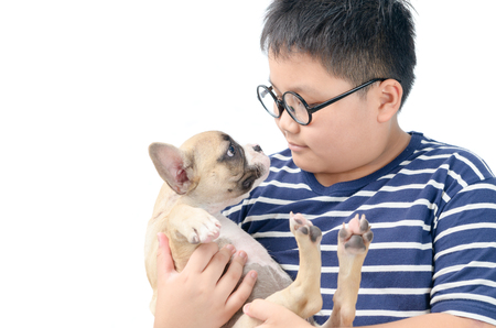 Fat boy holding french bulldog isolated on whiteの写真素材