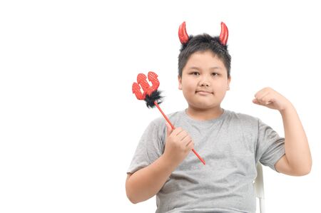 Handsome Fat boy with red horns and pitchfork isolated on whiteの写真素材