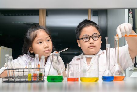 Happy two children making science experiments. Science and Education concept.の写真素材