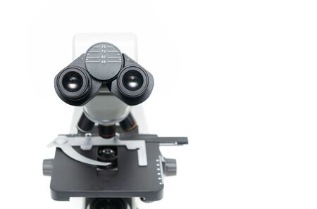 Closed up of microscope isolated on whiteの写真素材