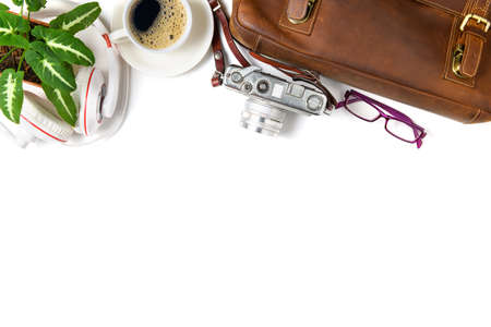 Vintage Leather bag and  vintage camera with black coffee isolated on white background, travel concept and copy sapce for input text.の写真素材