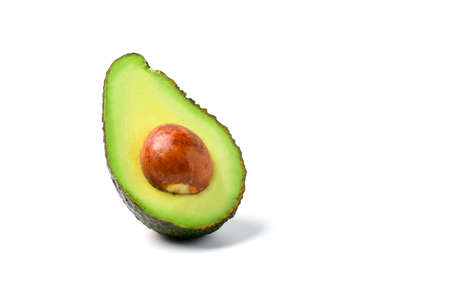 Avocado half isolated on white background. Ripe fresh green avocado