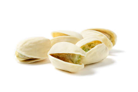 pistachios isolated on white background. Healthy nut conceptの写真素材