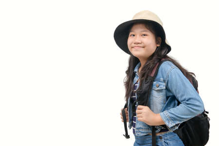 Cute traveler wear jeans jacket with backpack isolated on white background, travel conceptの写真素材