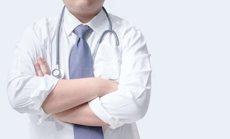 Young doctor wearing a white shirt with a necktie and stethoscope, health and occupation conceptの写真素材