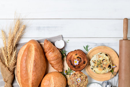 Homemade breads or bun on wood background, Croissant with Sourdough and Danish Pastry, breakfast and...