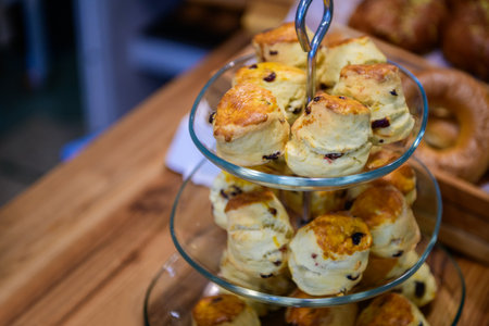 Traditional british scones with  strawberry jam for tea time in cafe. bakery conceptの写真素材