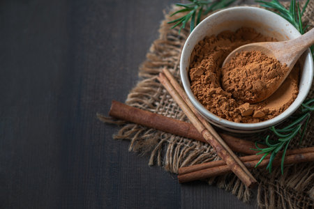 cinnamon powder in bowl Cinnamon is rich in antioxidants and other beneficial compounds and help support blood sugar control, protect against heart disease, and reduce inflammation.の写真素材