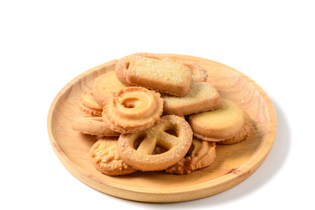 Set of danish butter cookies macro cutout. Five whole pretzel, round and rectangular shortbread biscuits with sugar on white background. Danish pastry and sweet food concept.の写真素材
