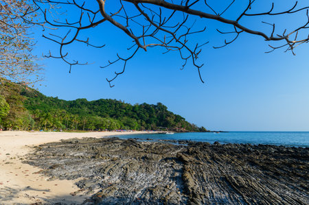landscape of Farang Beach or Charlie Beach, there are many rock on the sandy beach It is an ideal beach for watching the most beautiful sunset on Koh Muk, Trang Province.の写真素材