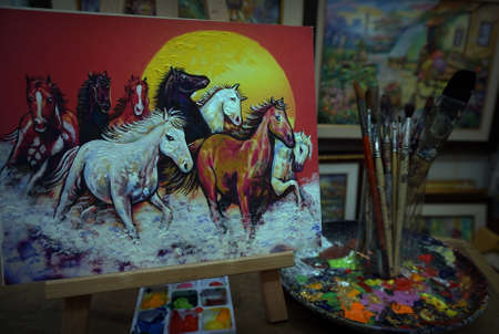 Art painting oil color , running horse Lucky , paint brushes, palette ,in gallery ,from thailandの写真素材