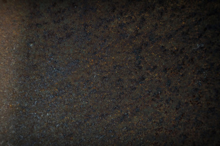 The surface of the steel plate is rusted.