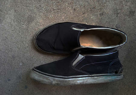 My old sneakers have been used for 10 months.の写真素材