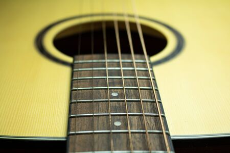 Close up of acoustic guitar with metal strings. Music conceptの写真素材