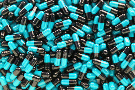 Many medicines pills capsules backgroundの写真素材
