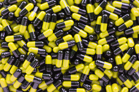 Many medicines pills capsules backgroundの写真素材