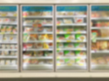 Commercial refrigerators in a large supermarket blurred backgroundの写真素材
